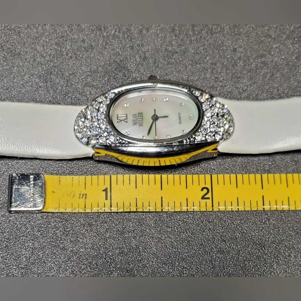 Nolan Miller Silver Tone Crystal Embellished Stainless Steel Ladies Watch